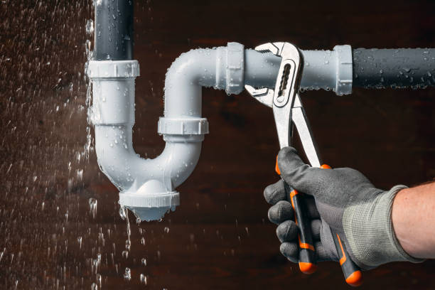 Professional Emergency Plumber technician working in Ames, IA